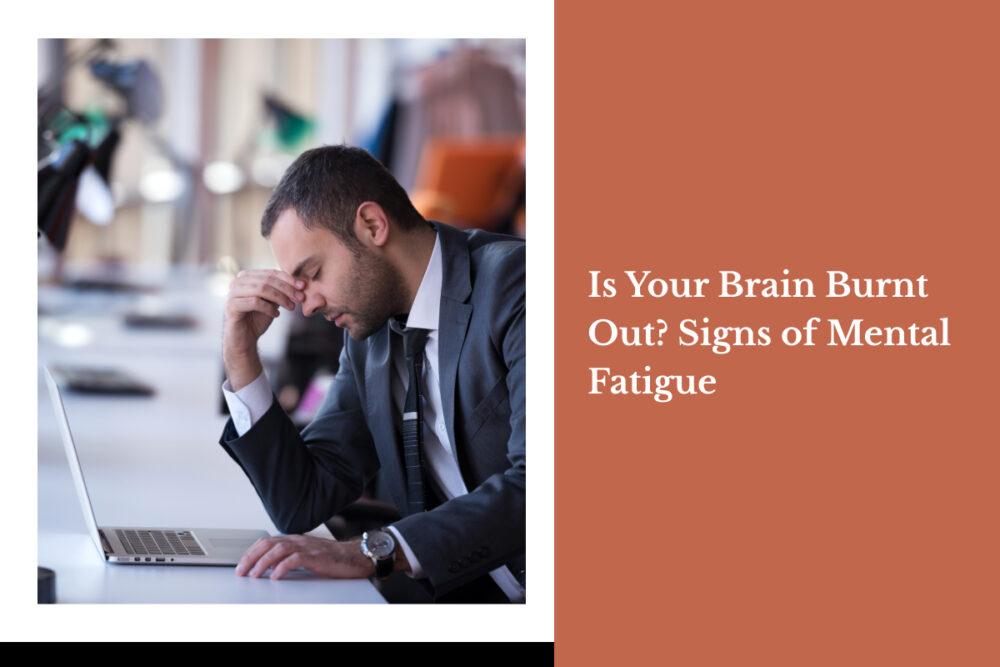 A man in a business suit sits tired in front of a laptop. Form Medical Aesthetics is ready to help you through the tough times and mental fatigue.